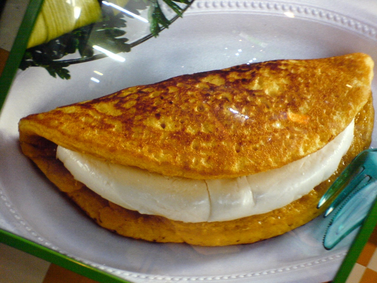 Cachapa accompanied with telita cheese